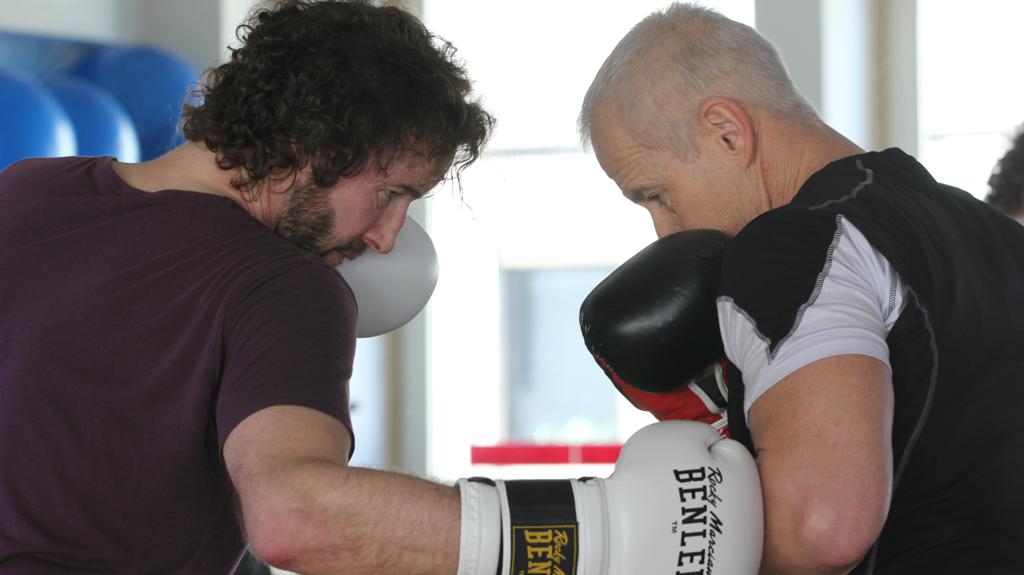 Managerboxen Coach Peter und Kunde Olli beim Boxtraining